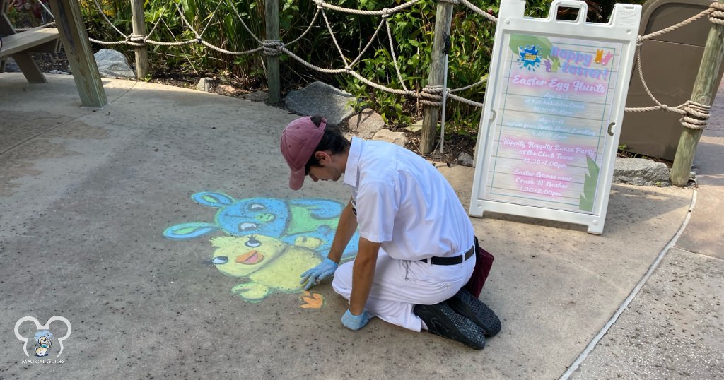 A cast member makes a chalk drawing at Typhoon Lagoon to celebrate Easter in the Disney Parks. Disney Cast Members are amazing!